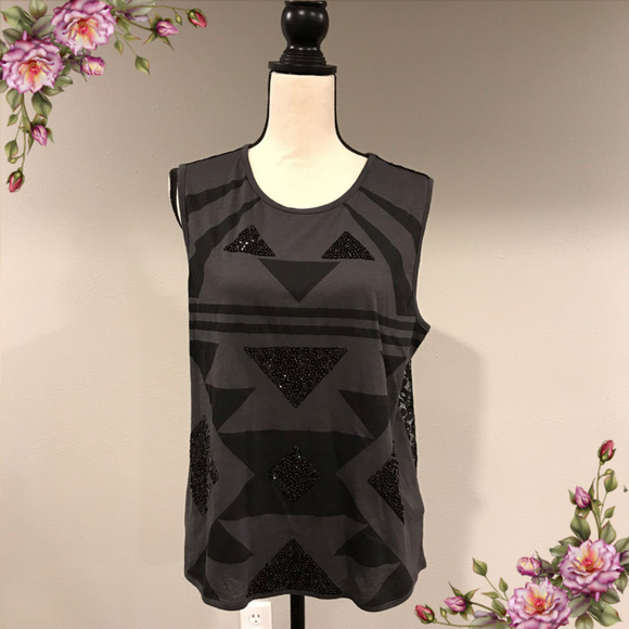 Express Tops - 🌺 3/25$  sleveless sequin geometric lace back top
